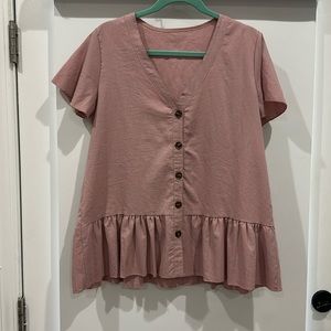 Pink peplum style top